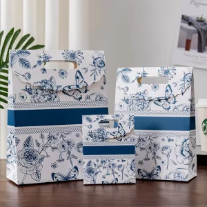Cross border High end Flower Gift Bag White Cardboard Floral Butterfly Pattern Flip Top Hand held Packaging for Holiday