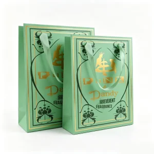 Custom Paper Gift Bag Luxury Green Specialty Paper Bag with Ribbon Handles Gold Foil Stamping and UV Printing