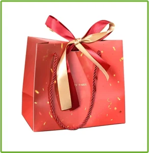 Custom Red Paper Gift Bag With Ribbon Bow and Rope Handle for Holiday Gift Packaging