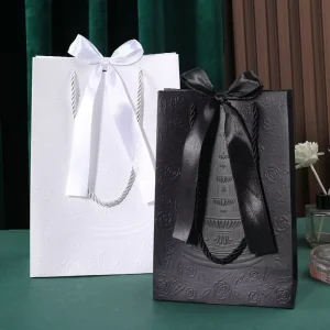 High-End Embossed Craft Rose Flower Luxury White Cardboard Gift Bag for Birthday Wedding Holiday Packaging Jiaxiang Brand